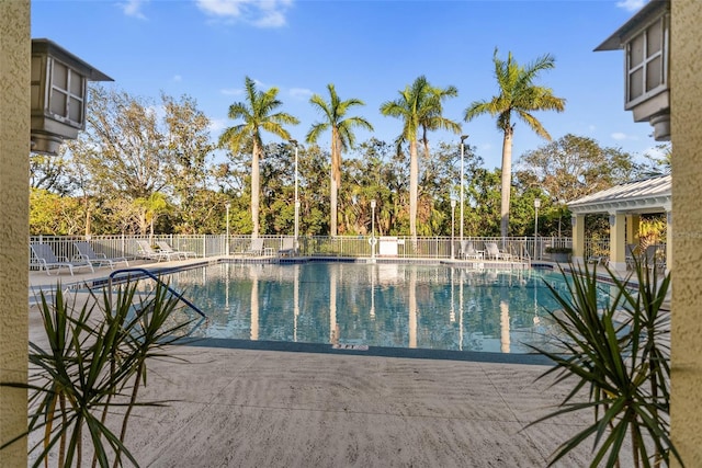 view of swimming pool featuring a patio area