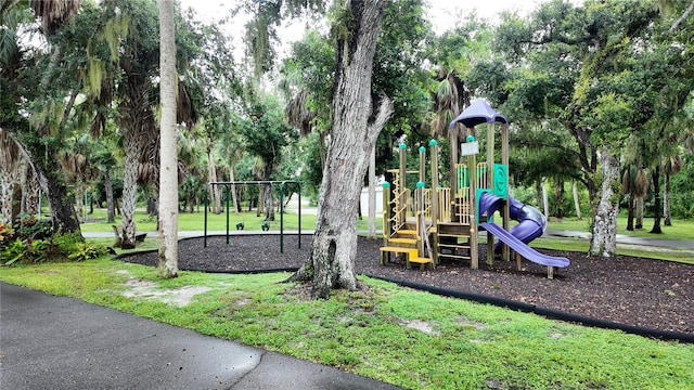 view of jungle gym with a yard