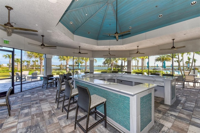 view of patio / terrace featuring a gazebo, an outdoor bar, and ceiling fan