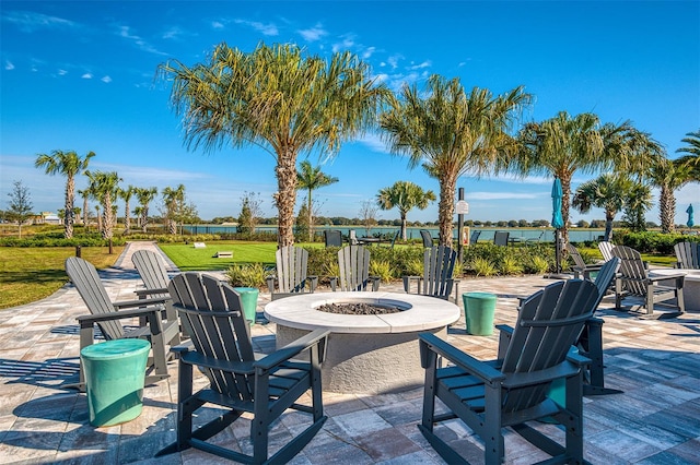 view of patio / terrace featuring an outdoor fire pit