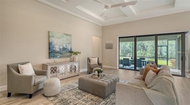 living room with beamed ceiling, coffered ceiling, hardwood / wood-style flooring, ornamental molding, and ceiling fan