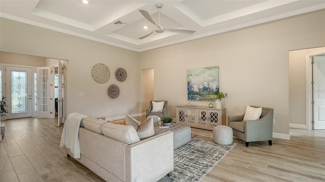 living room with a towering ceiling, coffered ceiling, ornamental molding, beam ceiling, and ceiling fan