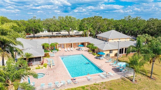 view of pool featuring a patio