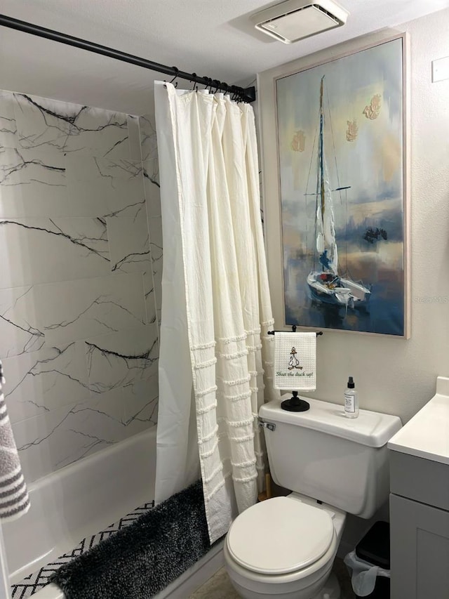 full bathroom featuring toilet, vanity, and shower / tub combo with curtain