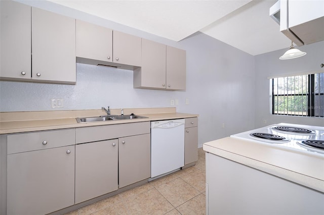 kitchen featuring sink, dishwasher, and light tile floors