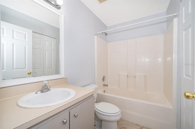 full bathroom featuring tub / shower combination, toilet, and vanity