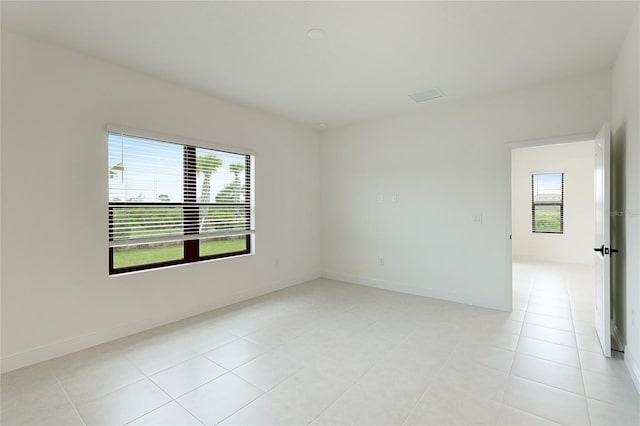 view of tiled spare room