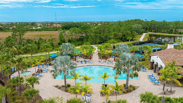 view of swimming pool featuring a water slide