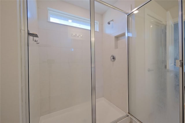 bathroom with an enclosed shower