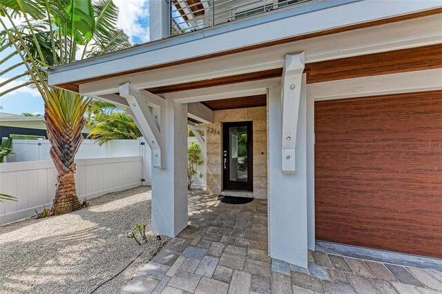 entrance to property featuring a patio area