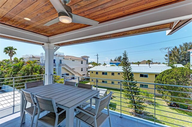 exterior space with a yard and ceiling fan