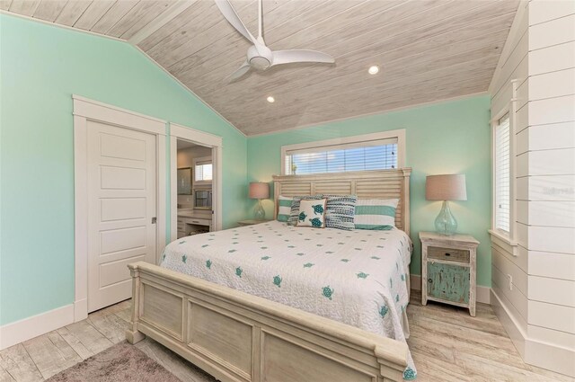 bedroom with wood ceiling, light hardwood / wood-style flooring, ceiling fan, and vaulted ceiling