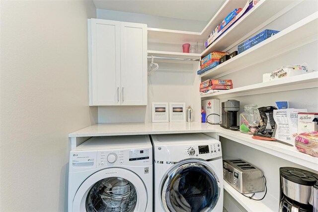 clothes washing area with independent washer and dryer