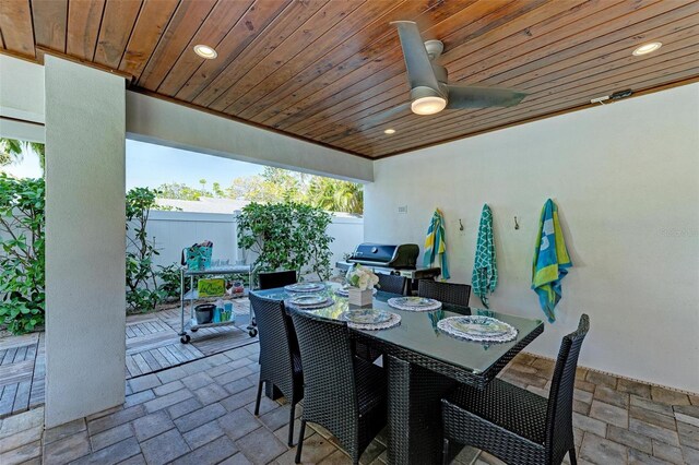 view of terrace featuring ceiling fan and grilling area