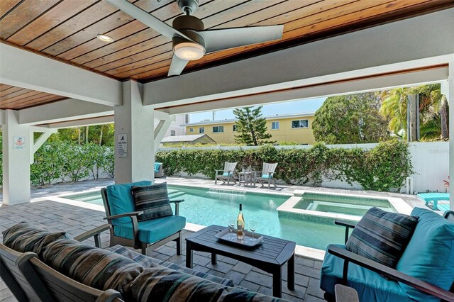 view of pool featuring a patio, ceiling fan, and outdoor lounge area