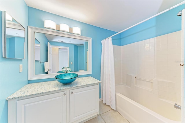 bathroom featuring shower / tub combo with curtain, vanity, and tile floors