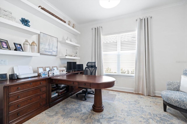 office with light wood-type flooring and ornamental molding