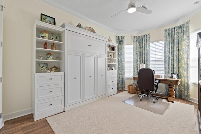 office with light hardwood / wood-style flooring, ceiling fan, and ornamental molding