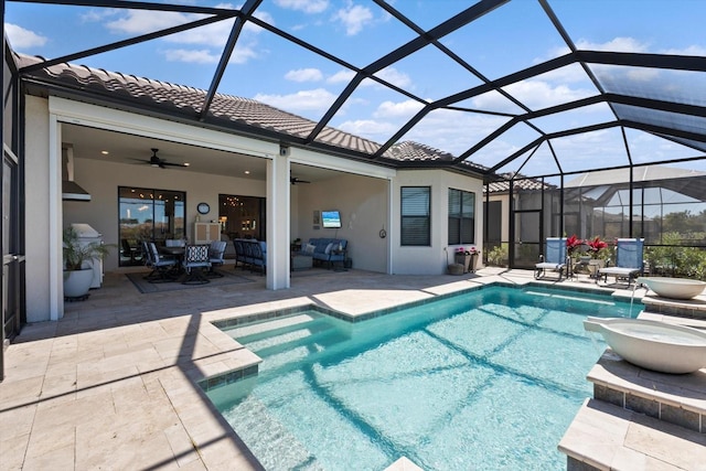 view of swimming pool with glass enclosure, an outdoor living space, ceiling fan, and a patio