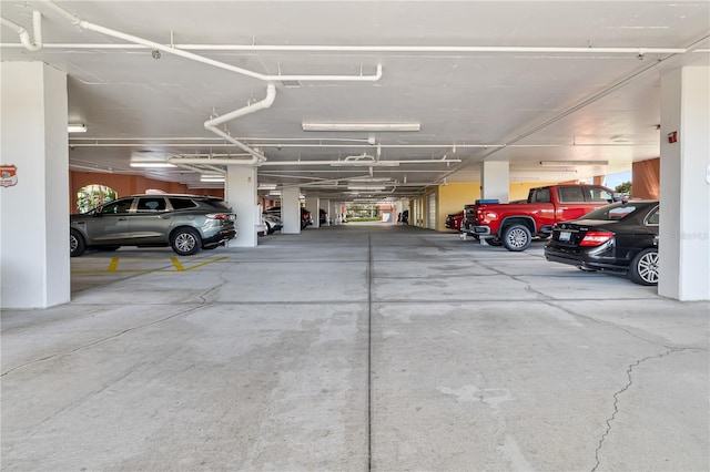 garage featuring a carport