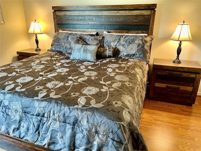 bedroom featuring light wood-style floors