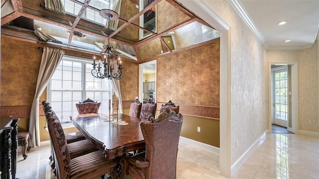 tiled dining room with crown molding and an inviting chandelier