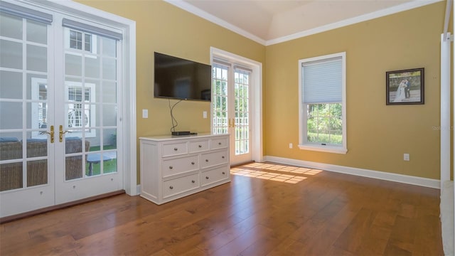 doorway to outside with ornamental molding, french doors, and hardwood / wood-style flooring