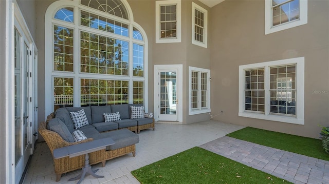 view of terrace with an outdoor living space