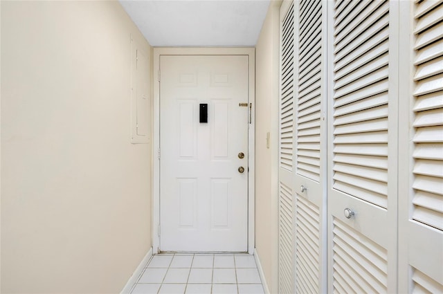 entryway with light tile floors