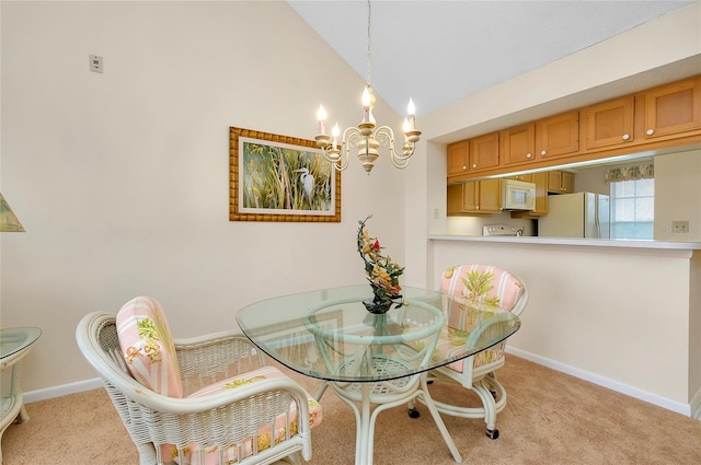 carpeted dining space featuring vaulted ceiling and a notable chandelier