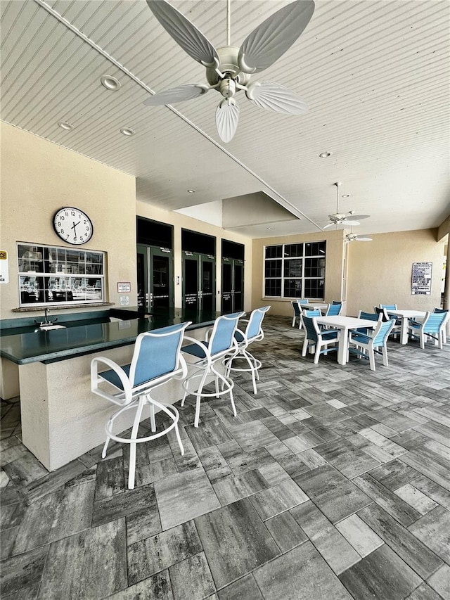 view of patio / terrace featuring ceiling fan