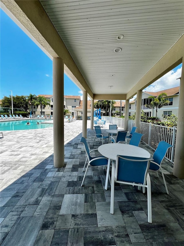 view of patio / terrace featuring a community pool