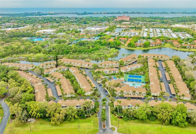 drone / aerial view with a water view