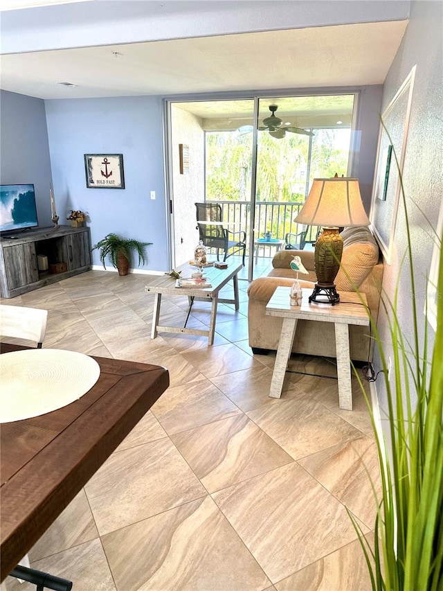 living room featuring ceiling fan