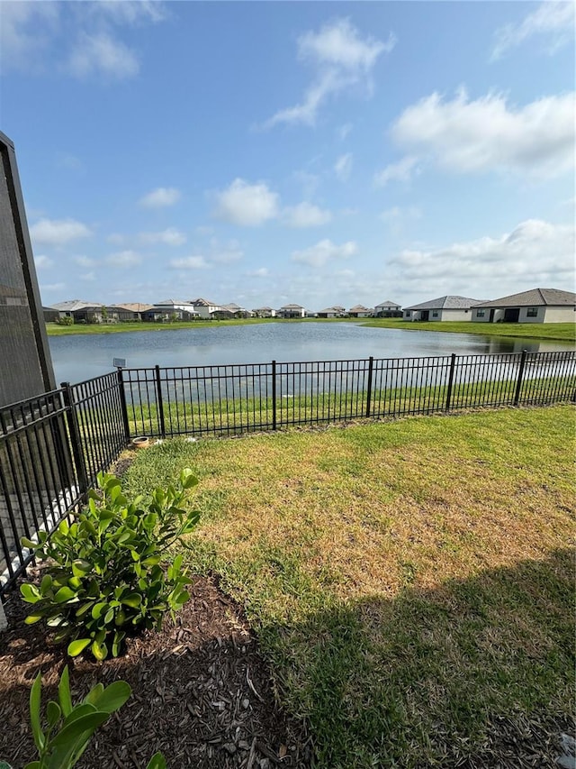 view of yard featuring a water view