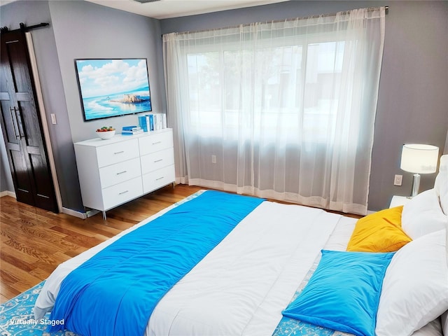 bedroom featuring hardwood / wood-style floors