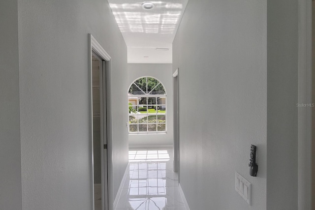 hallway featuring tile floors