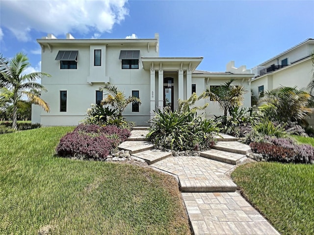 view of front of house featuring a front yard