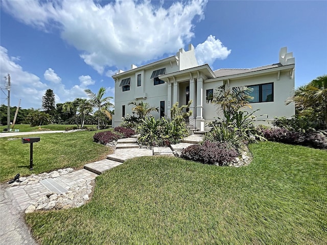 view of front facade with a front yard