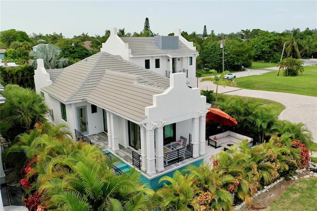 exterior space featuring a patio area and a yard