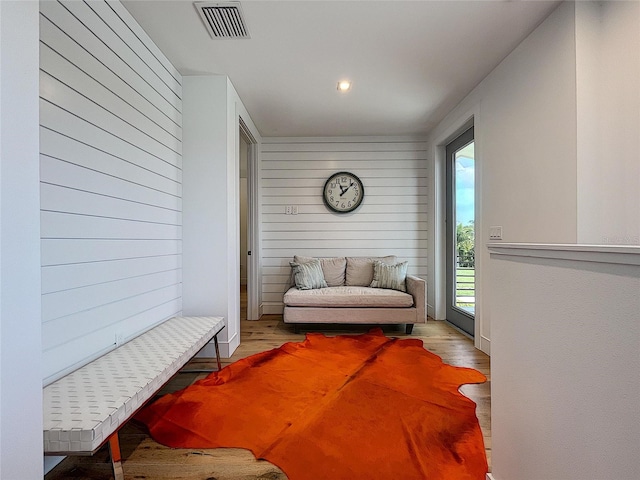 living area with light hardwood / wood-style floors