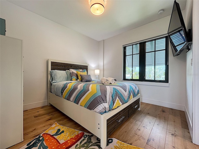 bedroom featuring hardwood / wood-style floors