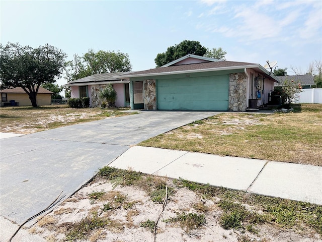 single story home with a garage