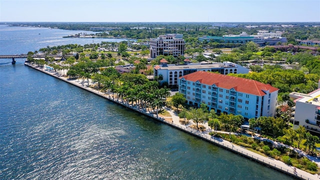 birds eye view of property featuring a water view