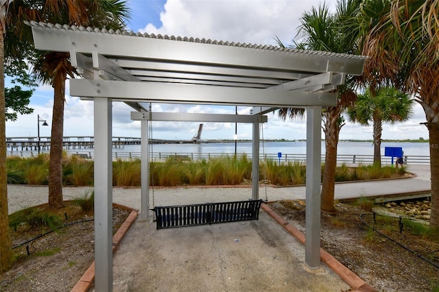 view of patio featuring a water view