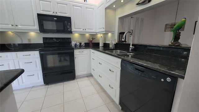 kitchen featuring black appliances, light tile patterned flooring, sink, and white cabinets