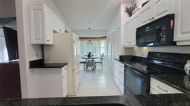 kitchen with dark stone counters, black appliances, decorative light fixtures, and white cabinets