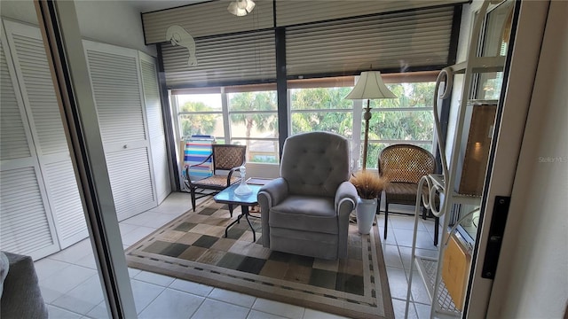 sitting room featuring tile patterned flooring