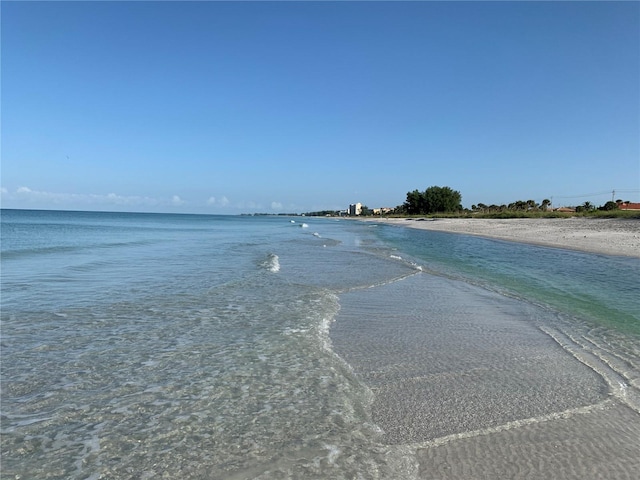 property view of water featuring a beach view