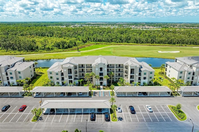 bird's eye view with a water view